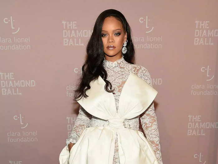 Rihanna wore a sheer lace Alexis Mabille jumpsuit to her fourth annual Diamond Ball in September 2018.