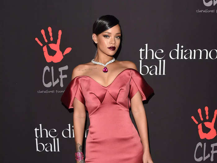 For her first-ever Diamond Ball, the host went for elegance in a silky red gown by Zac Posen in December 2014.