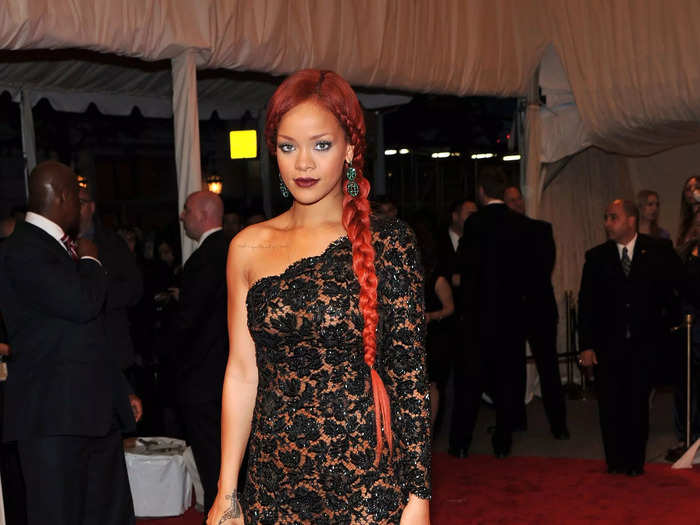 At the Met Gala in May 2011, Rihanna showed up with a long red braid and another semi-sheer gown.