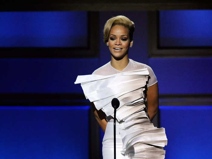 Rihanna accepted her Glamour Woman of the Year award in an intricate white gown by Stephane Rolland in November 2009.