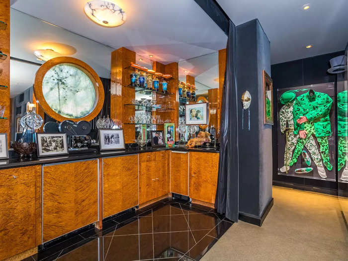 The costume worn by the Golden Globe-winning actor when he played The Riddler in "Batman Forever" is on display in the bar area.