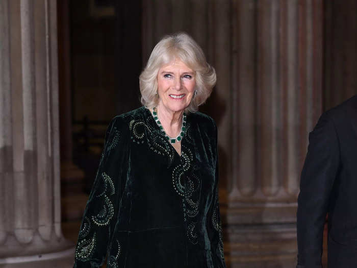 Camilla, then-Duchess of Cornwall wore an all-green look that stood out against the red carpet at a 2022 reception.