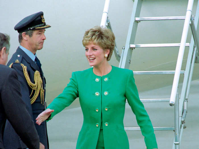 In 1992, she stepped off a plane in France in a bright green skirt suit.