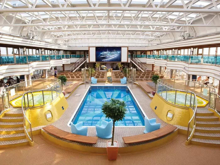 To help its guests pass the time, the 2,826-guest ship houses six dining venues, five bars, and a pool deck with amenities like water slides.