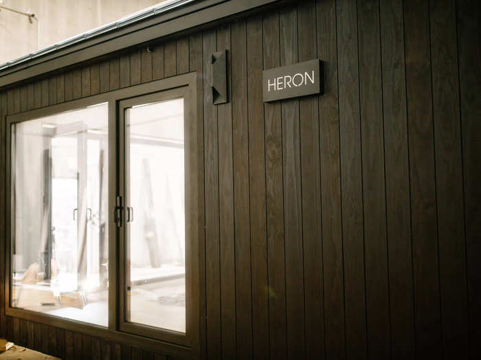 Whoever ordered the cabin names it — in this case, Heron — and PrefabPads creates a custom sign.