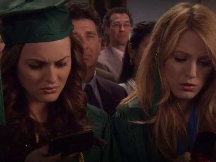 Every student reads a "Gossip Girl" blast during graduation.