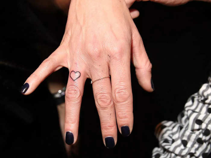 Finger placement tattoos became popular, with quirky small designs like moustaches, hearts, or smiley faces.