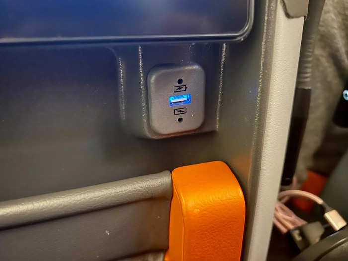 Meanwhile, the airline did not skimp on charging options in premium economy. There were three ports total, including the USB port on the seatback screen…