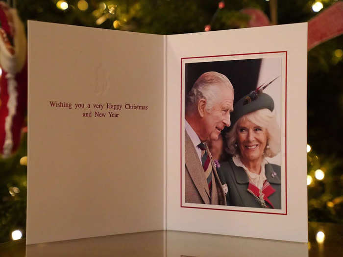 Charles and Camilla released their first Christmas card as king and queen consort on December 11, 2022. The card featured a photo of Camilla smiling at Charles at the Braemar Games in Scotland.