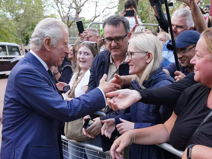 In between his formal engagements, the king greeted his new subjects in his first days as monarch.