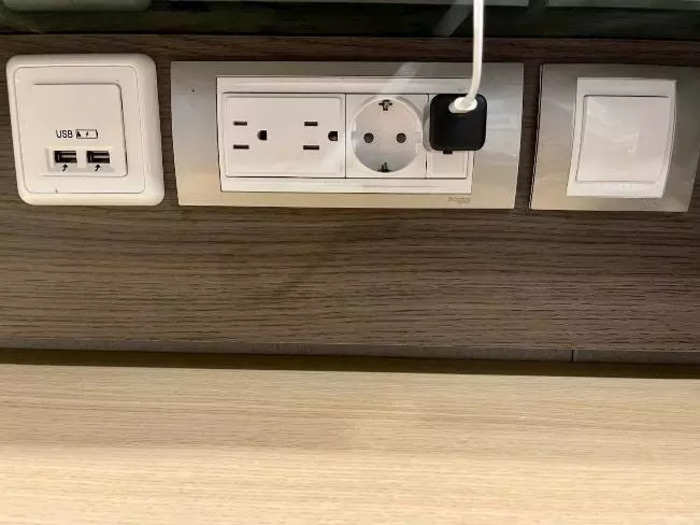 The outlets in the desk area offered a variety of different plug types.