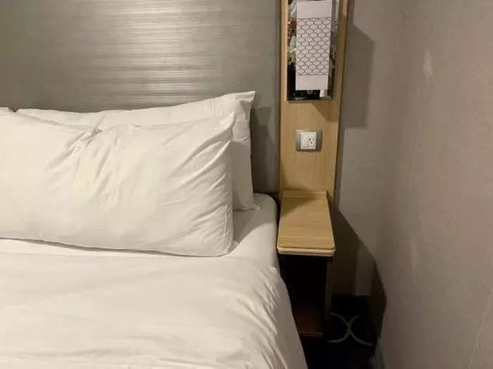 I like having my phone close by at night, so I was surprised to see just one outlet by the bed.