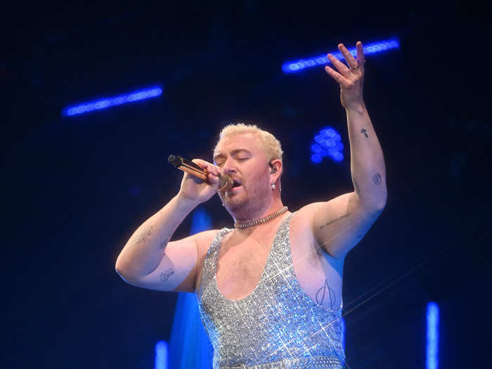 At Jingle Ball in December 2022, Smith performed in a glittery one-piece jumpsuit with a belt to match.