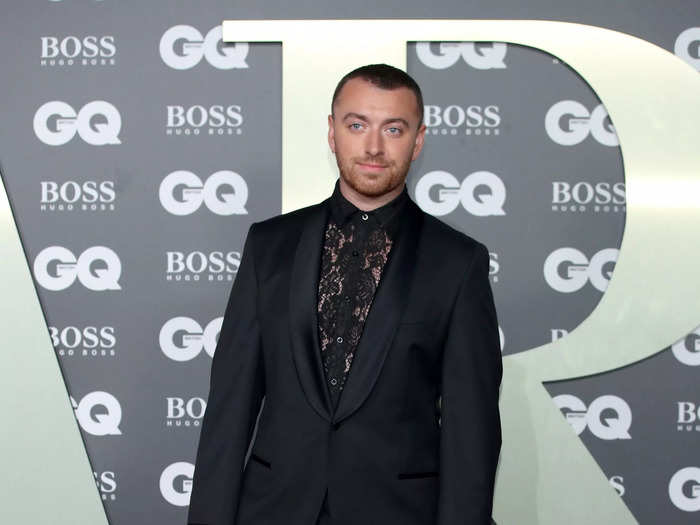 In September 2019, Smith walked the GQ Men of the Year Awards red carpet in a black lace undershirt, slim black suit, and Gucci heeled boots.