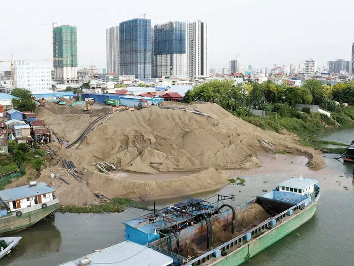 However, thousands of people who have lived and worked on these waterfronts for years are facing eviction as the sand barges grow closer and the government hands their property over to private investors.