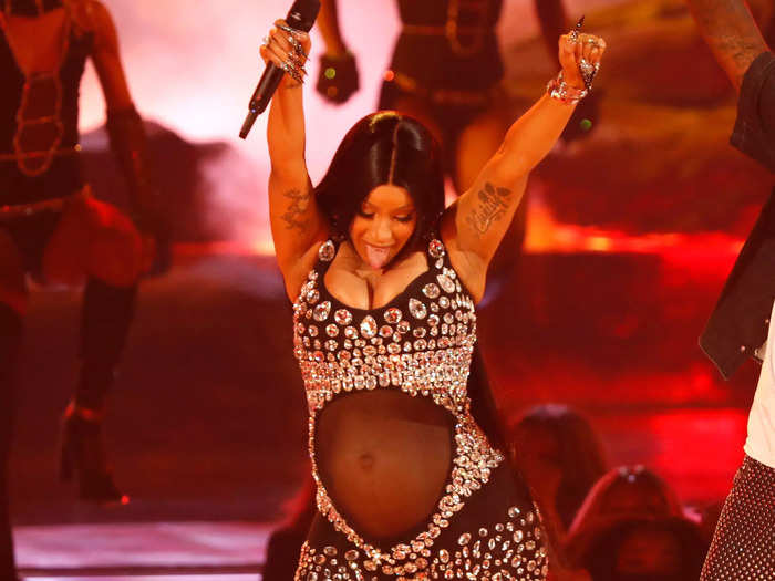 Cardi B wore another semi-sheer outfit to share that her second child was on the way while performing at the 2021 BET Awards.