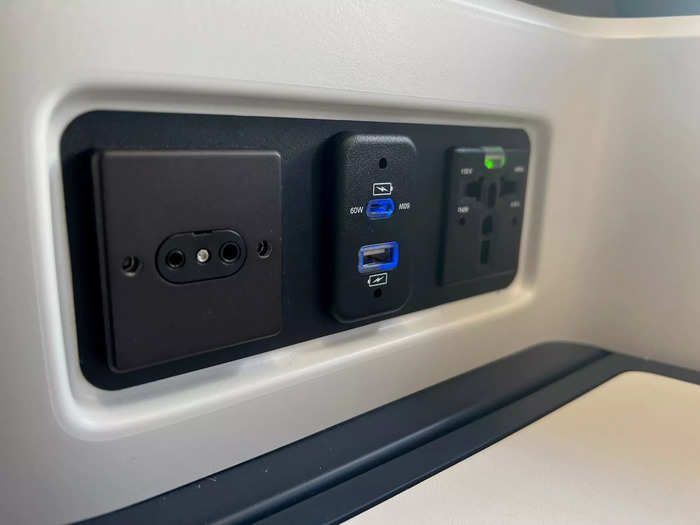 …a universal power outlet and USB-A/C ports…