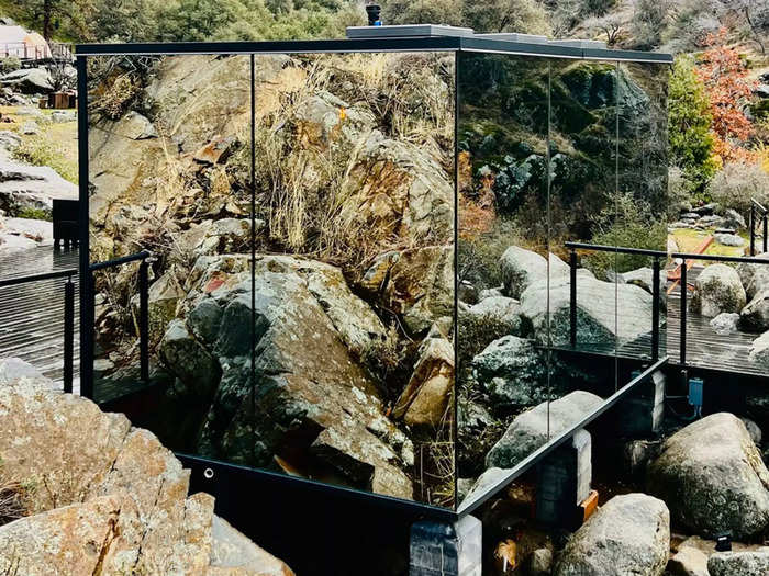 The mirror-clad homes are surrounded by mountains, a river, and views of the valley, making it a scenic retreat for people interested in vacationing near the giant sequoias.