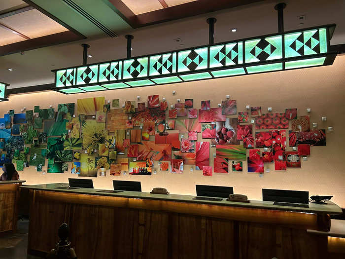 Photographs taken by young Hawaiian students line the lobby walls and create a rainbow collage.