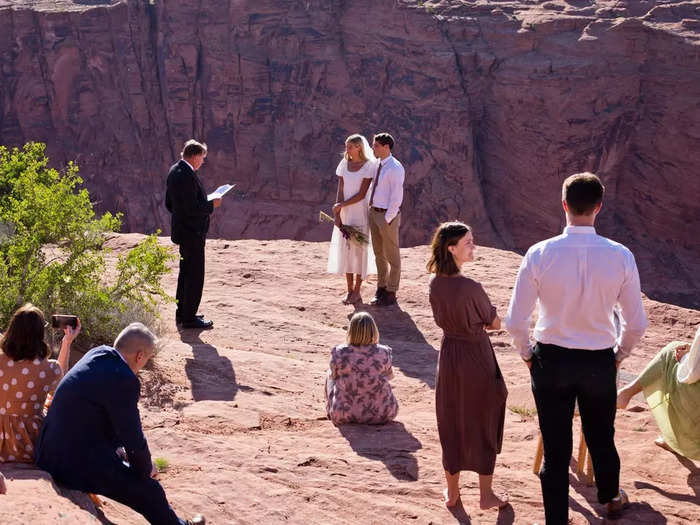 They had an outdoor ceremony in the desert in Glen Canyon, Arizona.