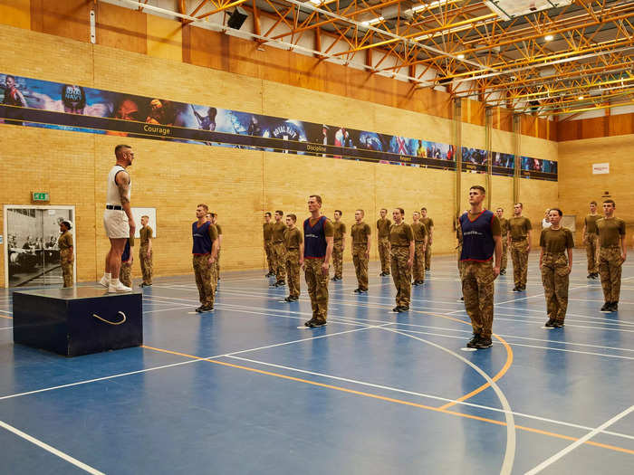 "Max effort all the way through," PT Anthony Carley shouts from his dias, a large box at one end of the gym.