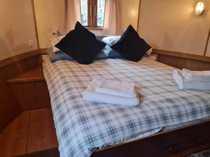 The boathouse has two bedrooms: a master bedroom ensuite (pictured), and another bedroom with two single beds.