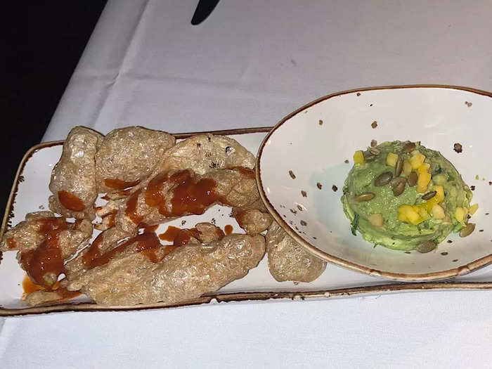 We ordered guacamole with chicharrones and Salsa Valentina as a starter.