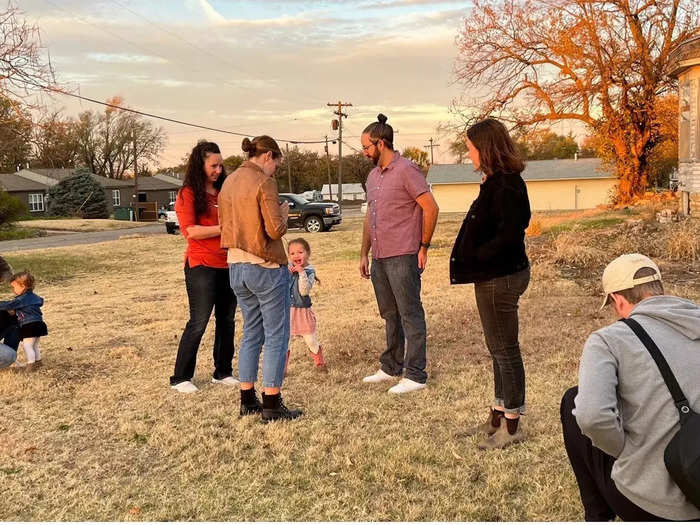 The Flores family visiting their new house in Lincoln, Nebraska. It