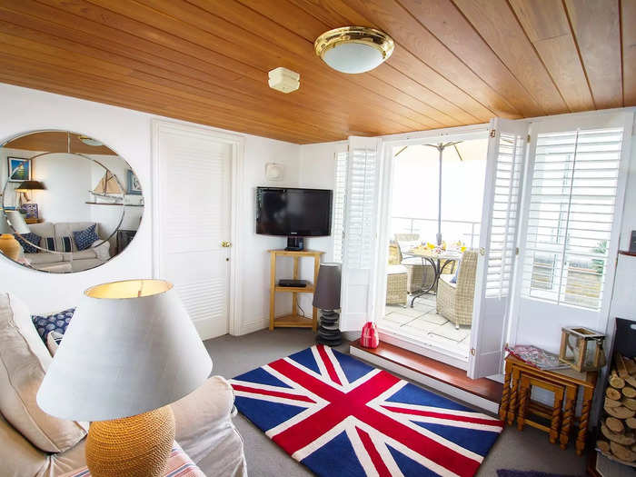 The holiday apartment has French doors leading on to a balcony with views of the English Channel.