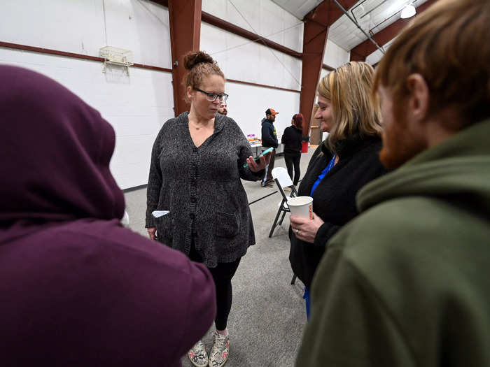 In real life, locals gathered around a resident named Jamie Cozza to hear news from a conference on her phone.