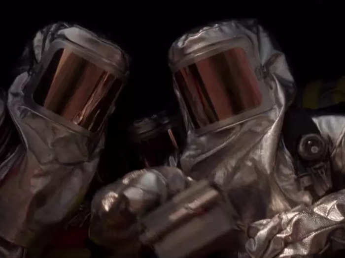 People in hazardous protection suits appear in the film too, although exactly what they