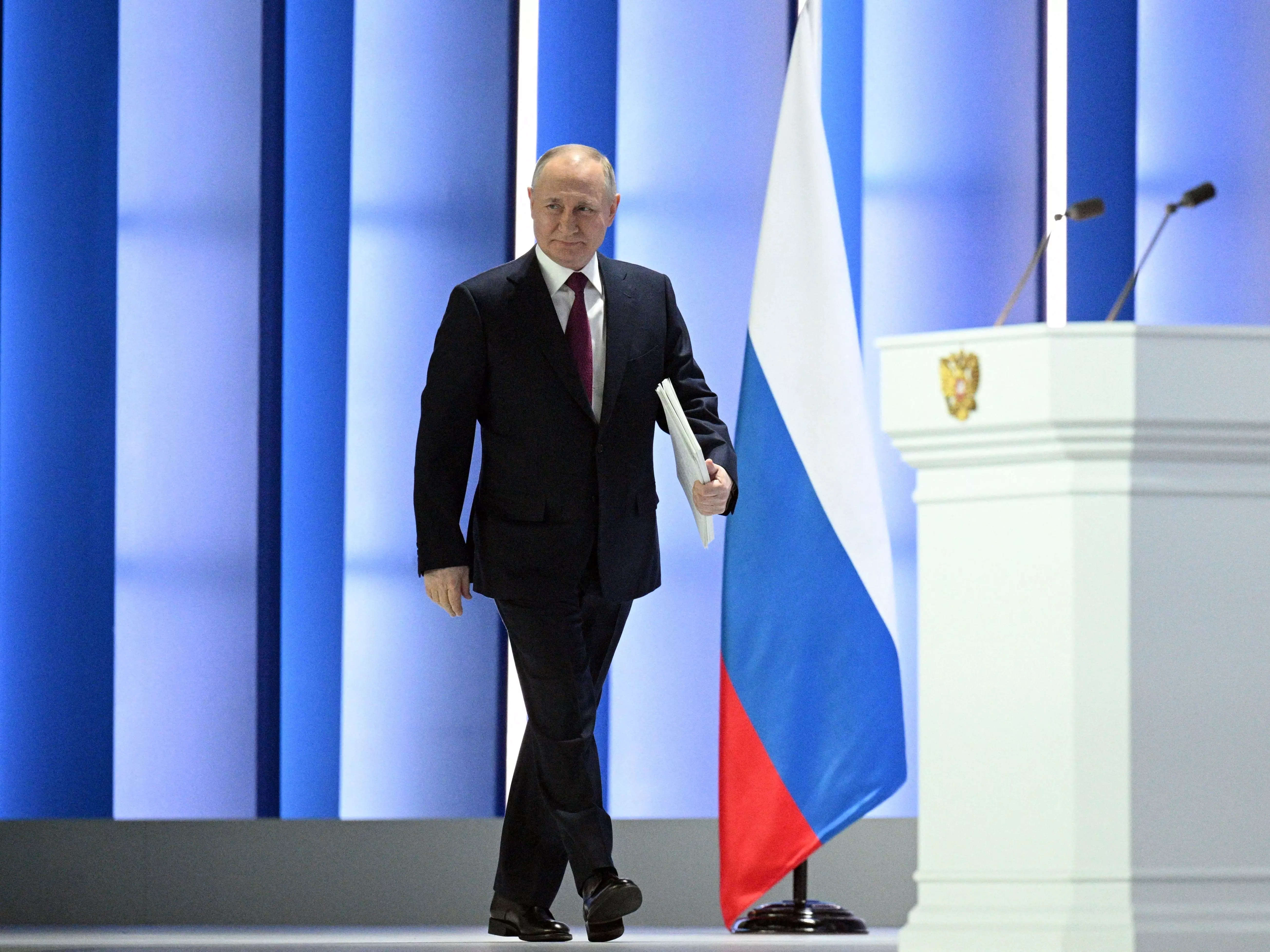 Russian President Vladimir Putin arrives to deliver his annual state of the nation address at the Gostiny Dvor conference centre in central Moscow on February 21, 2023.