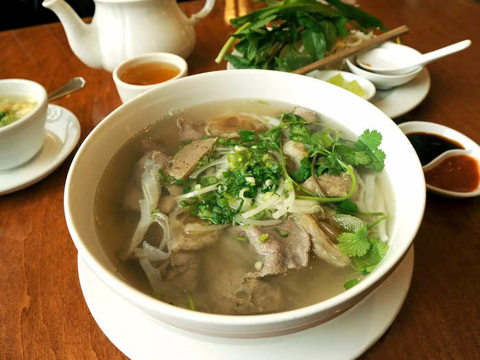 Dive into a warm bowl of pho, a Vietnamese noodle soup with tons of flavor.