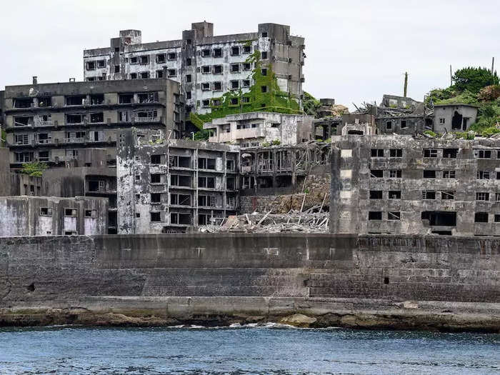 Hashima Island in Japan had 5,000 inhabitants at its peak, but it was left abandoned after its coal deposit ran out in the 