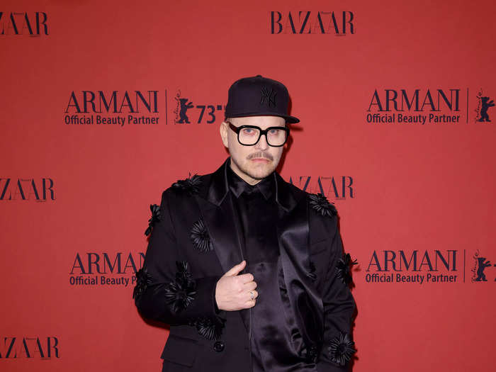 Armin Morbach also wore a black suit by the host designer to the dinner, but his was less fitted and had a fun flair.