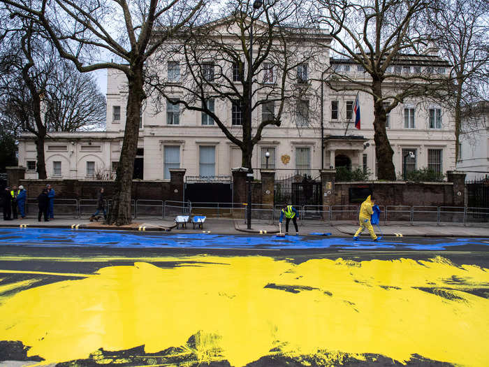 Protesters painted the road outside Russia