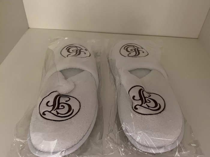 When I looked inside the closet, I noticed two pairs of Grand Floridian slippers and robes.