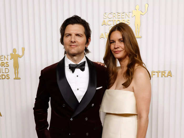 Adam Scott wore a simple tuxedo, while Naomi Scott wore a strapless, tea-length dress.