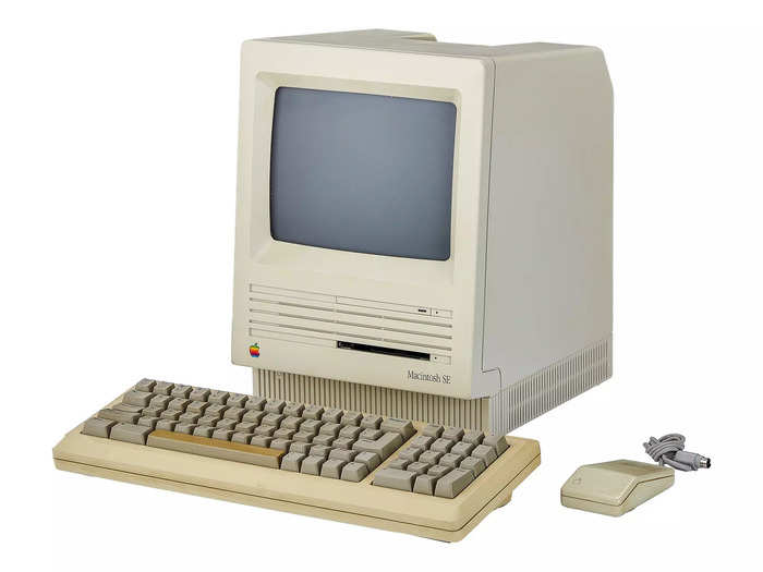 The 1986 Apple Macintosh SE computer was the first compact Macintosh model with a drive bay for a hard disk inside it, a second floppy drive, and an expansion slot. It is pictured here with a keyboard and mouse, and is estimated to auction for between $300 and $500.