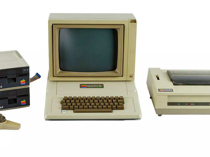 The 1979-1982 Apple II Plus Computer was the second model in the Apple II series which was produced between 1979 and 1982. It is pictured here with a monitor, two disk drives, a printer, and a pair of game paddles. It is estimated to auction for between $300 and $500.