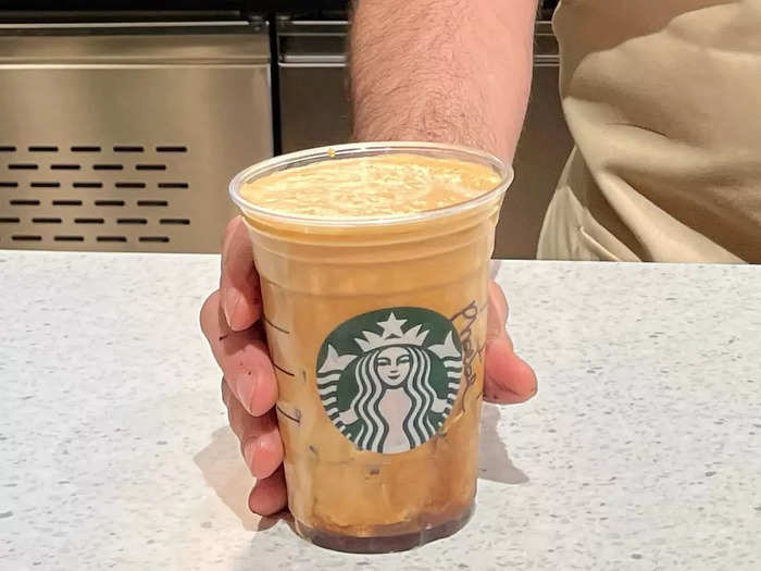 Next, I tried the iced shaken espresso, which came in a large plastic cup with a paper straw.