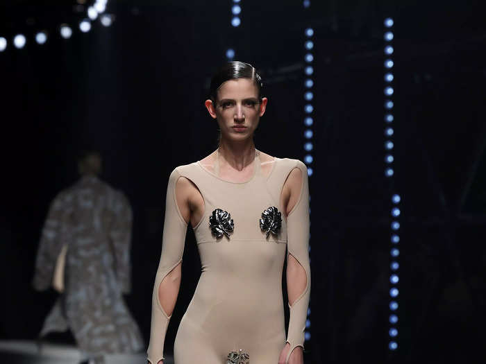 One particularly bold look seen on the Andreadamo runway featured arm cutouts and strategically-placed metal leaves.