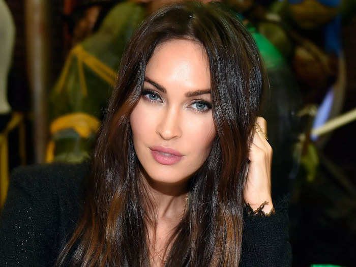 Megan Fox thinks her life-size R2-D2 is cool.