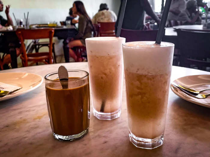 The beverages were served first: nutmeg punch, which cost 6 ringgit, or $1.30, and kopi o — hot coffee with less sugar — for 5.50 ringgit, or $1.20. Lean Gaik said even the drinks were made by "my hands."