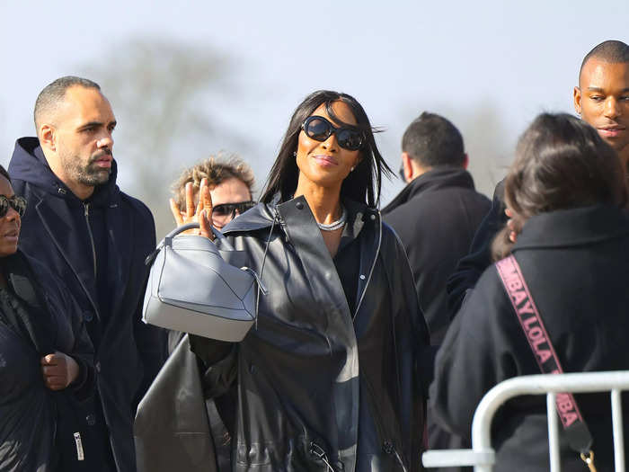 Likewise, Naomi Campbell made her shoes the star of her outfit at the Loewe show. Her heels appeared to be decorated with deflated balloons.