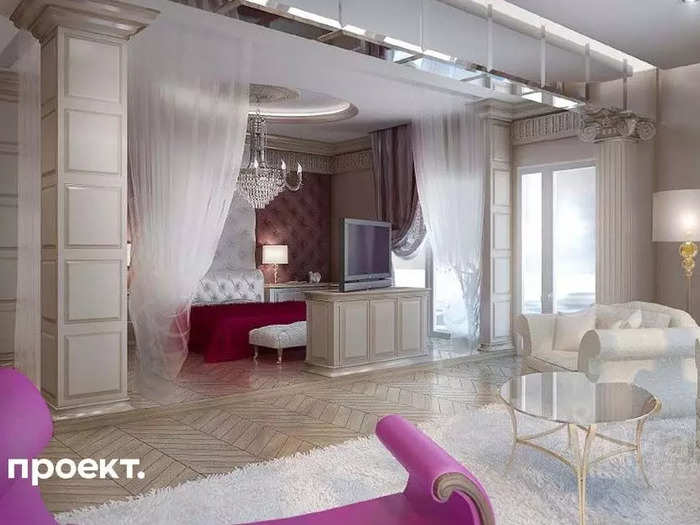 The penthouse features a crystal chandelier dangling above the bed inside a massive bedroom.