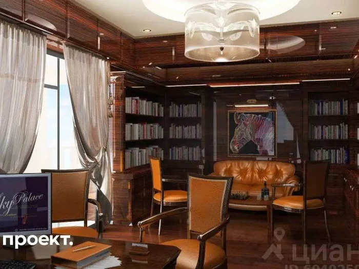 The luxury digs include a warm, wood-paneled study with an ocean view.