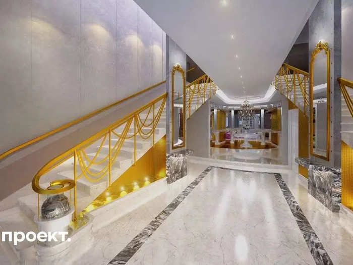 The penthouse features a set of gold and marble grand staircases.