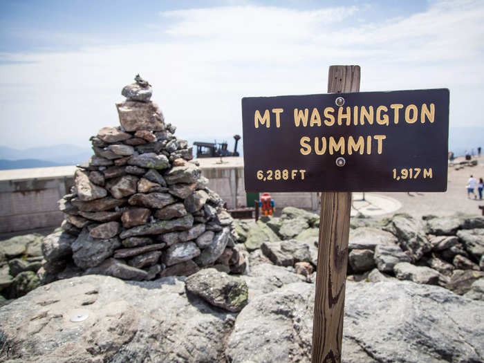 At the summit, we waited in line to take a photo of the Mount Washington summit sign.