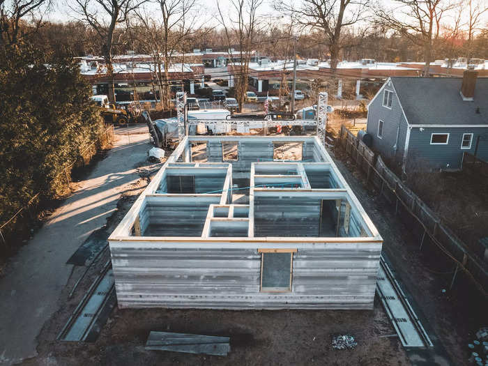 Once the walls are built and some wood framing is installed, this is what the house looks like.